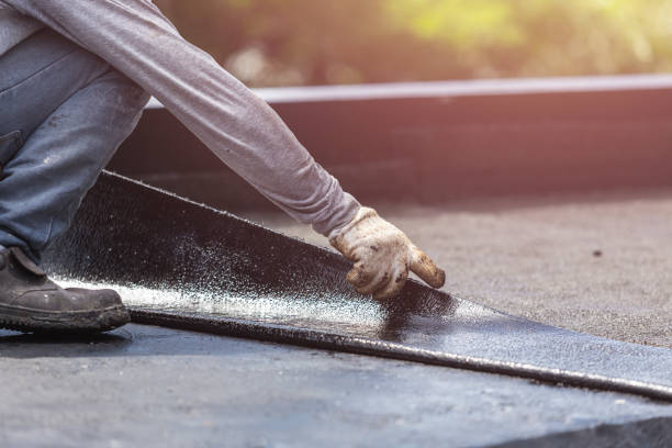 Professional Waterproofing technician working in Webster, IN